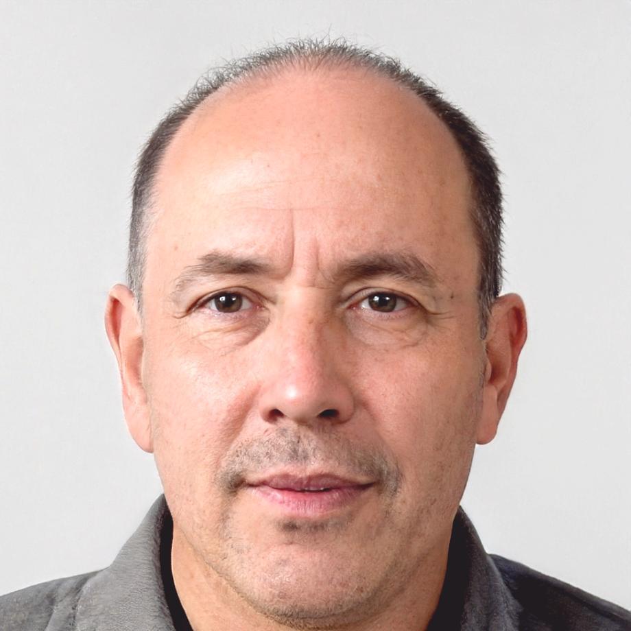 Professional headshot of corporate finance expert